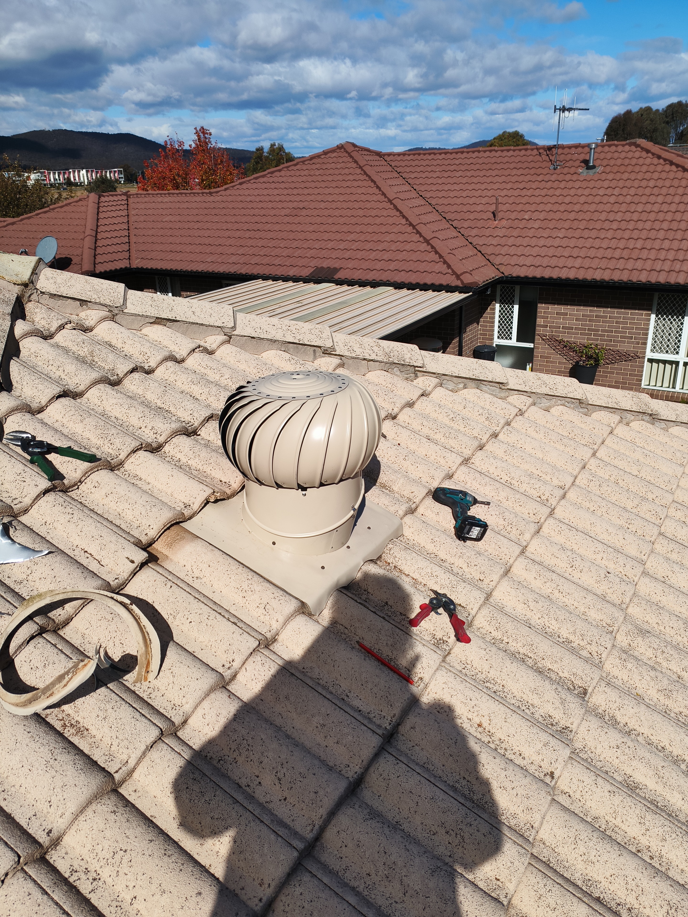Whirlybird ventilator on roof by Luke Roof Walker